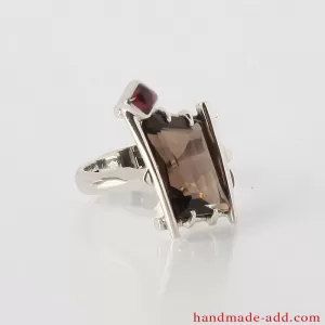 Sterling Silver Ring with genuine Garnet and Smoky Quartz.