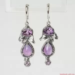 Oval Cut Purple Amethyst set in Sterling Silver Earrings. Dangle Silver Earrings with natural Amethyst.