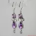 Oval Cut Purple Amethyst set in Sterling Silver Earrings. Dangle Silver Earrings with natural Amethyst.