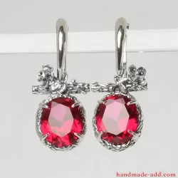 Rubies Earrings. Sterling Silver Earrings with corundum. Textured sterling silver and silver flowers are handcrafted.