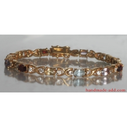Tennis bracelet multi stone multi color. Sterling silver tennis bracelet gold plated.